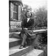 Miriam Beckerman seated on the steps of Chudleigh House, 136 Beverley St., Toronto, April 1945. Ontario Jewish Archives, Blankenstein Family Heritage Centre, item 3637.|